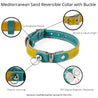 Features of  yellow and aqua reversible leather cat collar. Shows details on buckle adjustment, the keeper, the ring, and the magnetic breakaway feature.