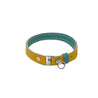 Yellow and aqua reversible leather cat collar with a magnetic breakaway feature. Showing our simplified and lightweight design with minimal hardware.