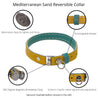 Features of  yellow and aqua reversible leather cat collar. Shows details on ring adjustment, the keeper, the alternative clasp for a lighter pull force, and the magnetic breakaway feature.